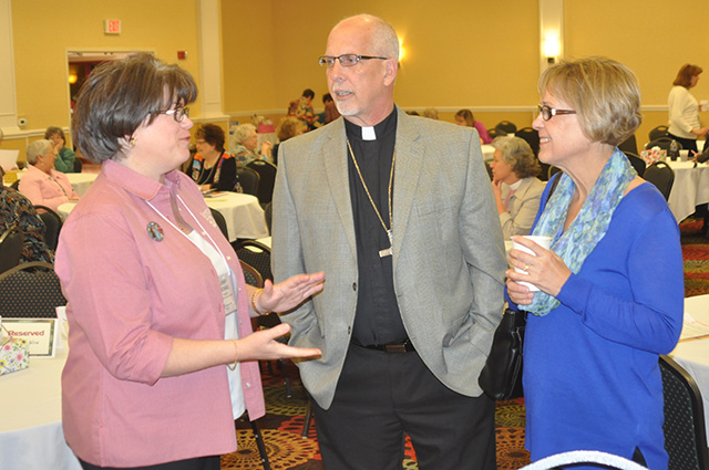 Bishop Rick Hoyme and wife Diane speak with Jenny Michael, President of Churchwide WELCA.
